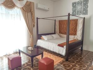 Postel nebo postele na pokoji v ubytování โรสชาเลต์ Rose Chalet + 37 fotografií