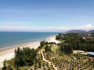 an aerial view of a beach and the ocean at Timurbay STUDIO APARTMENT - Seaview and Poolview by Dbayu - MU5LIM ONLY - Free WIFI in Kuantan