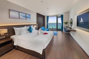 Canvas Danang Beach Hotel客房内的一张或多张床位