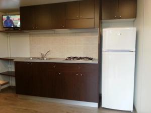 A kitchen or kitchenette at Villaggio Camping Europa