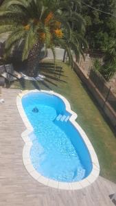 Bazén v ubytování Terrazza sul golfo degli angeli nebo v jeho okolí