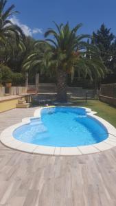 Bazén v ubytování Terrazza sul golfo degli angeli nebo v jeho okolí