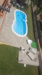 Bazén v ubytování Terrazza sul golfo degli angeli nebo v jeho okolí