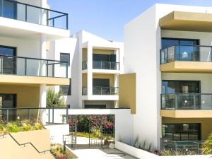 an image of an apartment building with balconies at Family apartments Albur Village II in Alvor