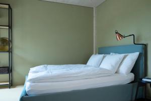 Postel nebo postele na pokoji v ubytování BnB Belle5