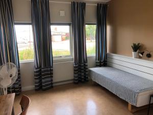 Postel nebo postele na pokoji v ubytování Spångholmen Bed & Breakfast AB + 29 fotografií
