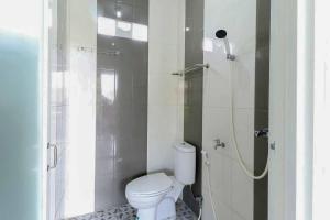 Koupelna v ubytování Griya Mulya near Alun Alun Batu Mitra RedDoorz
