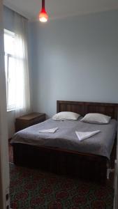 Postel nebo postele na pokoji v ubytování Mero House