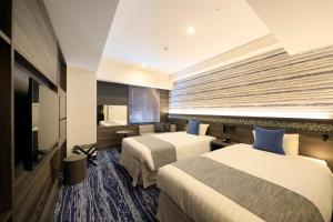Katil atau katil-katil dalam bilik di Quintessa Hotel Sapporo Susukino