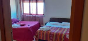 Posteľ alebo postele v izbe v ubytovaní Bed and breakfast lagiocosa