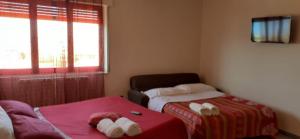 Posteľ alebo postele v izbe v ubytovaní Bed and breakfast lagiocosa