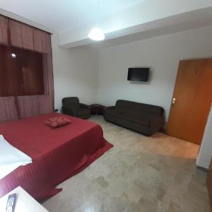 Televízia a/alebo spoločenská miestnosť v ubytovaní Bed and breakfast lagiocosa