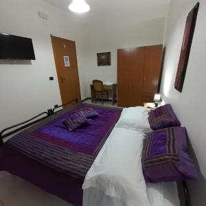 Posteľ alebo postele v izbe v ubytovaní Bed and breakfast lagiocosa