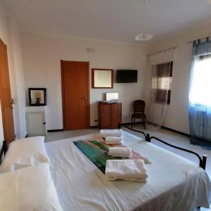 Posteľ alebo postele v izbe v ubytovaní Bed and breakfast lagiocosa