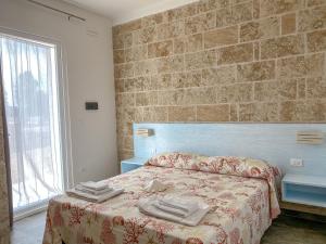 Postel nebo postele na pokoji v ubytování Residenza Case Arse