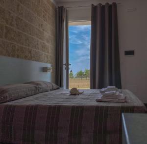 Postel nebo postele na pokoji v ubytování Residenza Case Arse