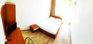 A bed or beds in a room at Villa Diana Self check-in