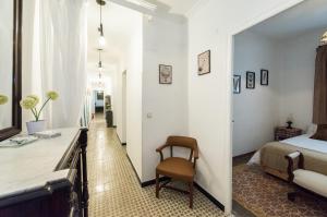 A bed or beds in a room at La Casa de Lope de Rueda