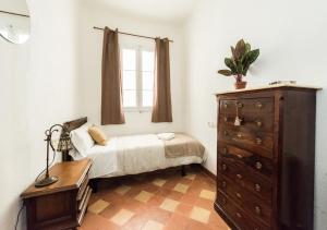 A bed or beds in a room at La Casa de Lope de Rueda
