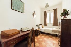 A bed or beds in a room at La Casa de Lope de Rueda