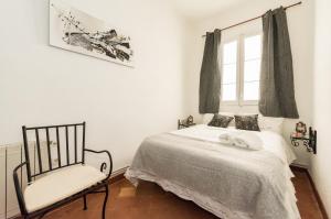 A bed or beds in a room at La Casa de Lope de Rueda