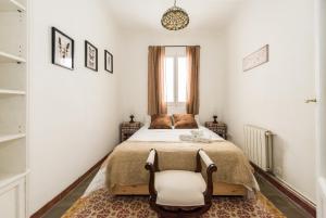 A bed or beds in a room at La Casa de Lope de Rueda