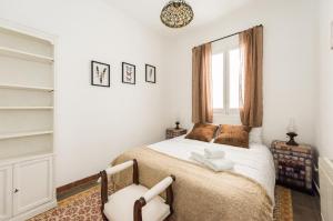 A bed or beds in a room at La Casa de Lope de Rueda