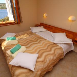 Postel nebo postele na pokoji v ubytování Holiday Home Katica