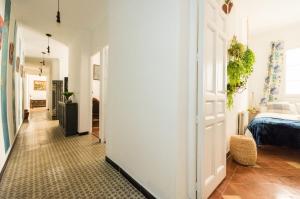 A bed or beds in a room at La Casa de Lope de Rueda