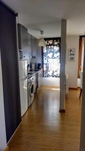 A kitchen or kitchenette at Los Molinos - Atico en Montaña de Asturias