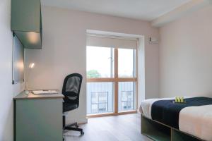 En eller flere senger på et rom på Swuite Dublin