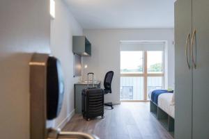 En eller flere senger på et rom på Swuite Dublin