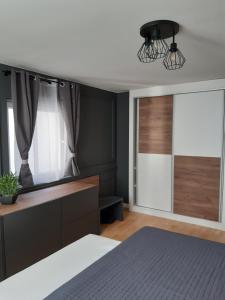 Postel nebo postele na pokoji v ubytování Rome Apartment