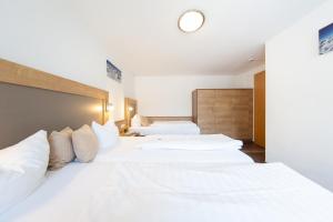 Posteľ alebo postele v izbe v ubytovaní Appartements Waldesrand
