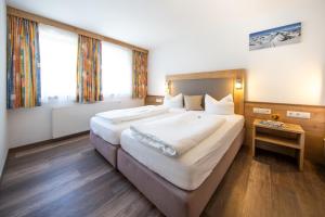 Posteľ alebo postele v izbe v ubytovaní Appartements Waldesrand