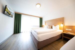 Posteľ alebo postele v izbe v ubytovaní Appartements Waldesrand