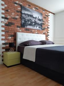Postel nebo postele na pokoji v ubytování Rome Apartment