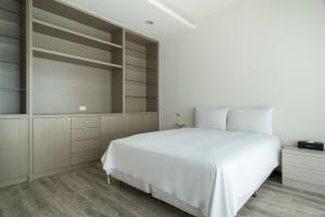Postel nebo postele na pokoji v ubytování Whoops Hotel