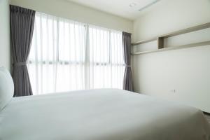 Postel nebo postele na pokoji v ubytování Whoops Hotel