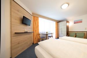 Posteľ alebo postele v izbe v ubytovaní Appartements Waldesrand