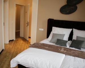 Postel nebo postele na pokoji v ubytování Z&B Hotel