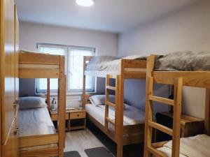 Ένα ή περισσότερα κρεβάτια σε δωμάτιο στο Bloom Inn