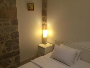 Postel nebo postele na pokoji v ubytování Hotel Maestral