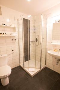 Ванная комната в Hermes Hotel Oldenburg
