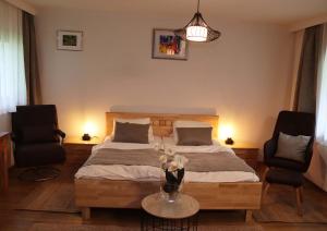 Postel nebo postele na pokoji v ubytování Fischerhof Appartements