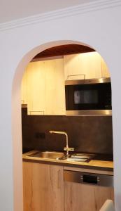 Kuchyň nebo kuchyňský kout v ubytování Fischerhof Appartements