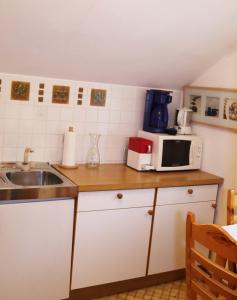 Kuchyň nebo kuchyňský kout v ubytování Fischerhof Appartements