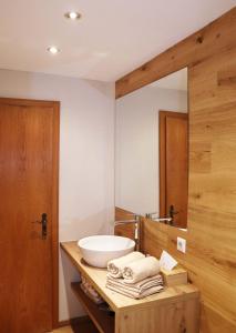 Postel nebo postele na pokoji v ubytování Fischerhof Appartements
