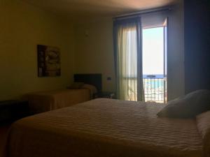 Castellammare Smart Rooms客房内的一张或多张床位