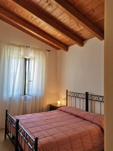 Кровать или кровати в номере Agriturismo Sole Luna